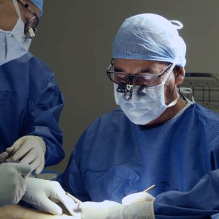 Surgeons during a procedure in the operating room